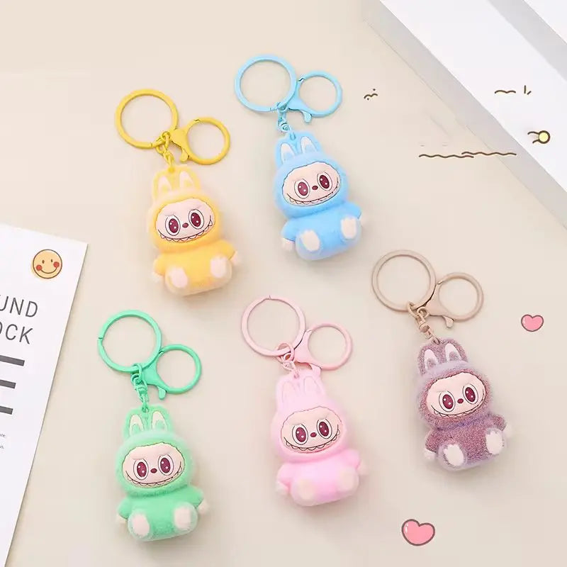 New Labubu Keychain Cartoon Labubu Backpack Pendant Decorative Car Keychain Model Doll School Bag Charm Cute Keyring Festivals